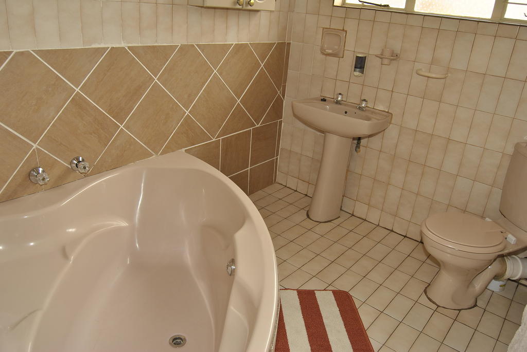 Ethen Guesthouse Полокване Стая снимка