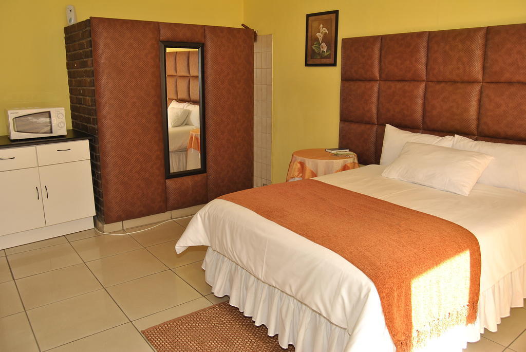 Ethen Guesthouse Полокване Стая снимка